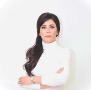 Dr. Mahdieh Pishgahi with a happy patient