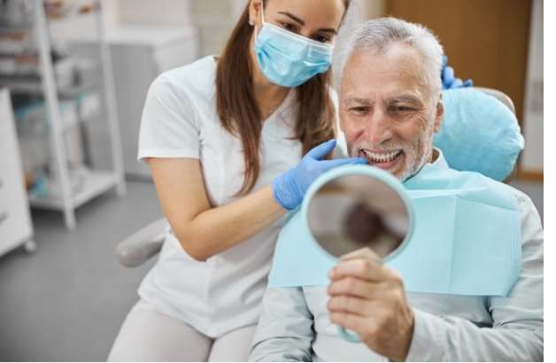 Transform your smile with All-on-4 implants Patient receiving All-on-4 dental implants