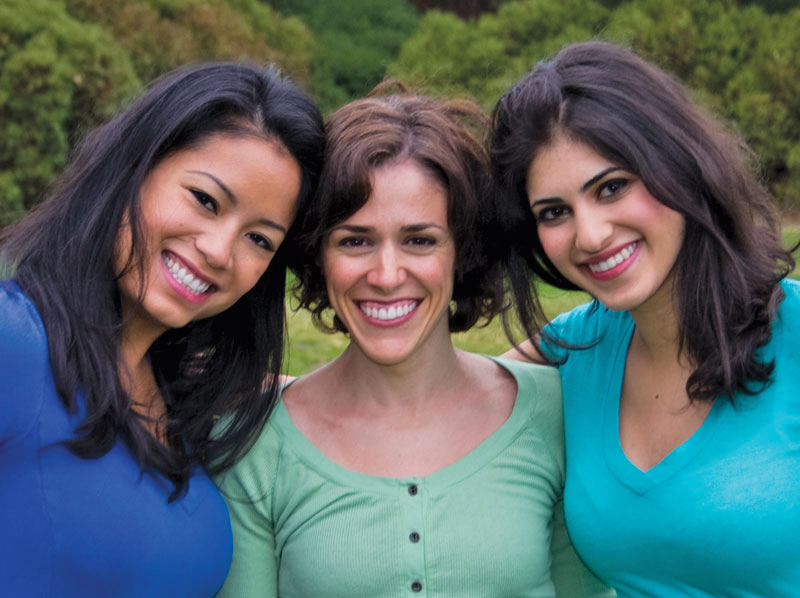 three smiling ladies